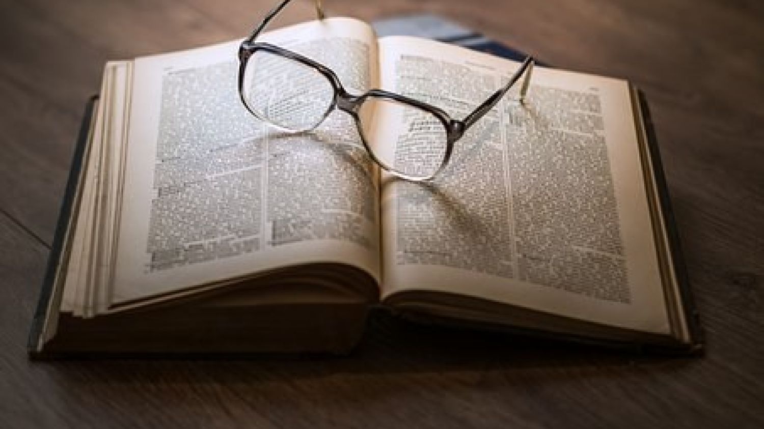 Glasses and book